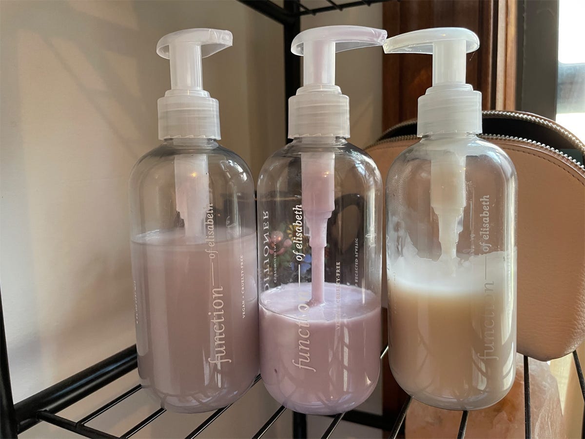 Elisabeth's Function of Beauty haircare lineup includes: purple shampoo, purple conditioner, and leave-in treatment.