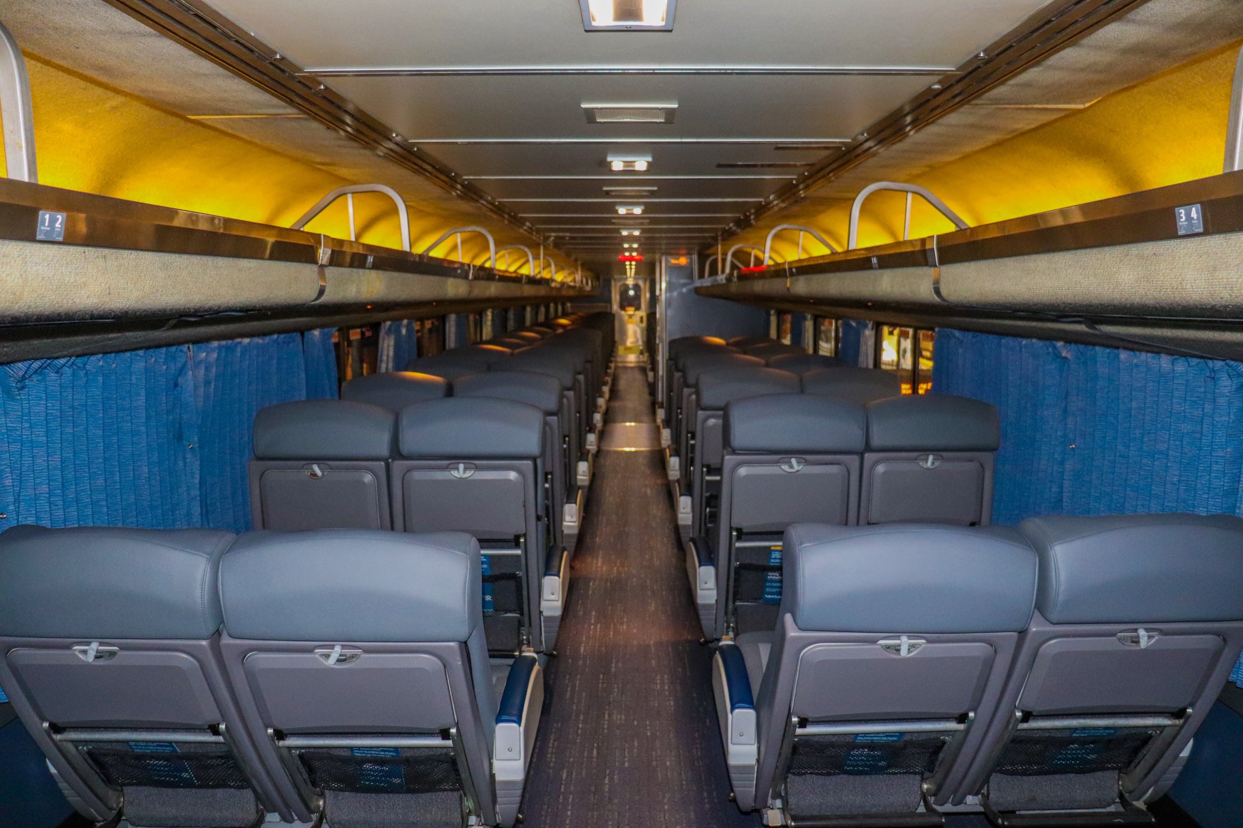 Inside the coach cabin of an Amtrak Superliner - Amtrak Upgraded Long Distance Trains 2021