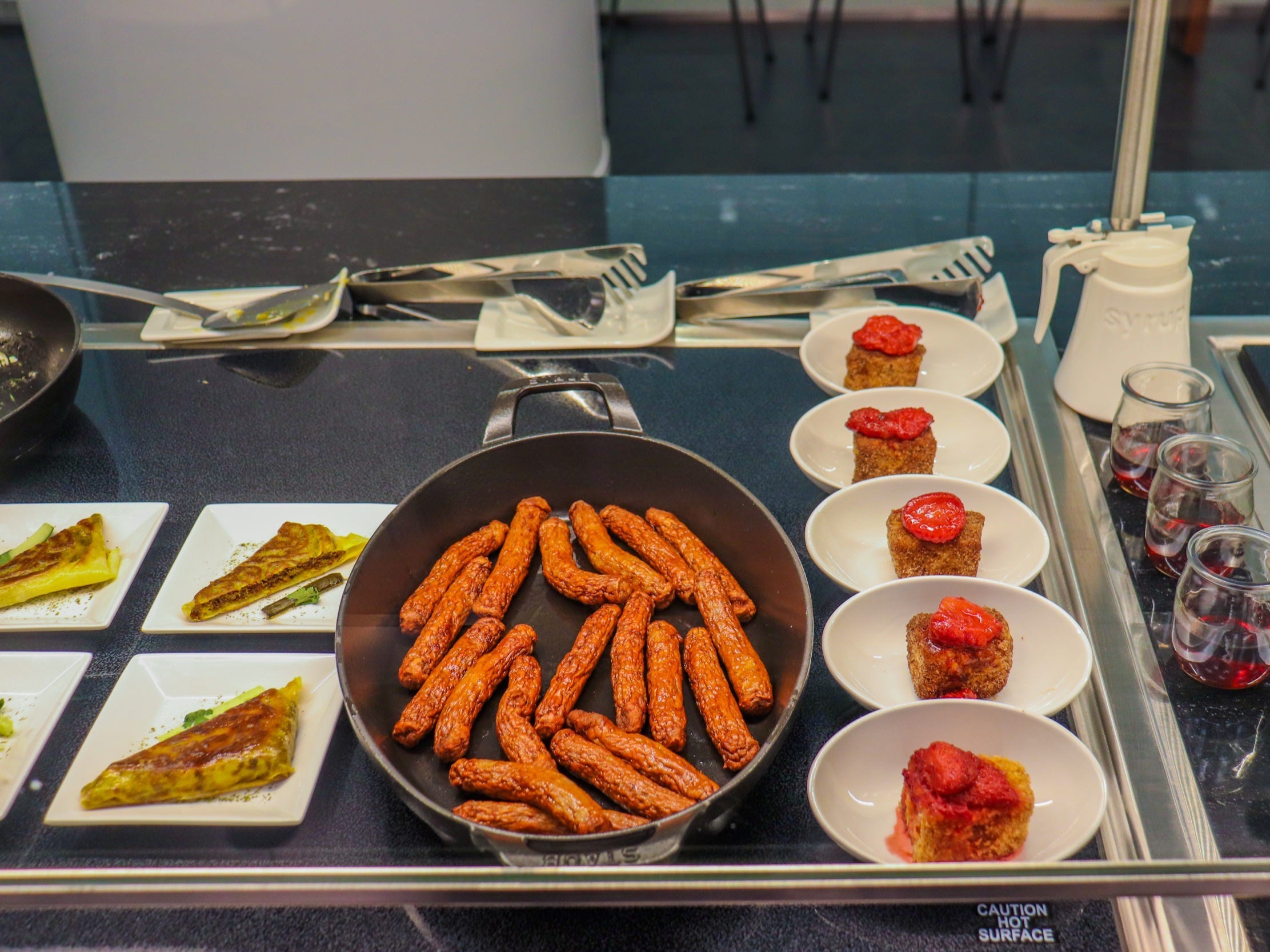 The hot food buffet at the American Express Centurion Lounge at LaGuardia Airport - Amex Centurion Lounge LaGuardia Airport