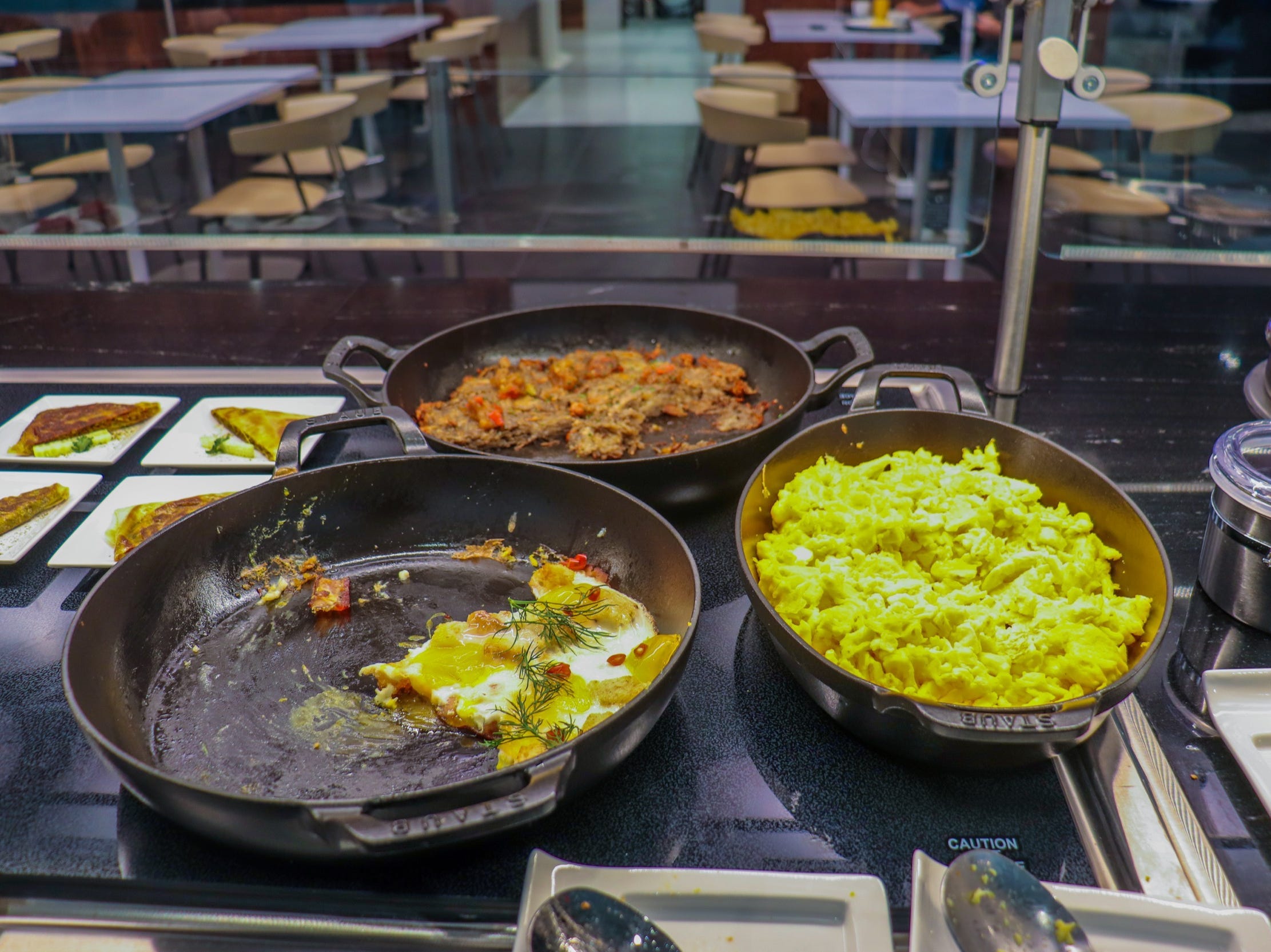 The hot food buffet at the American Express Centurion Lounge at LaGuardia Airport - Amex Centurion Lounge LaGuardia Airport