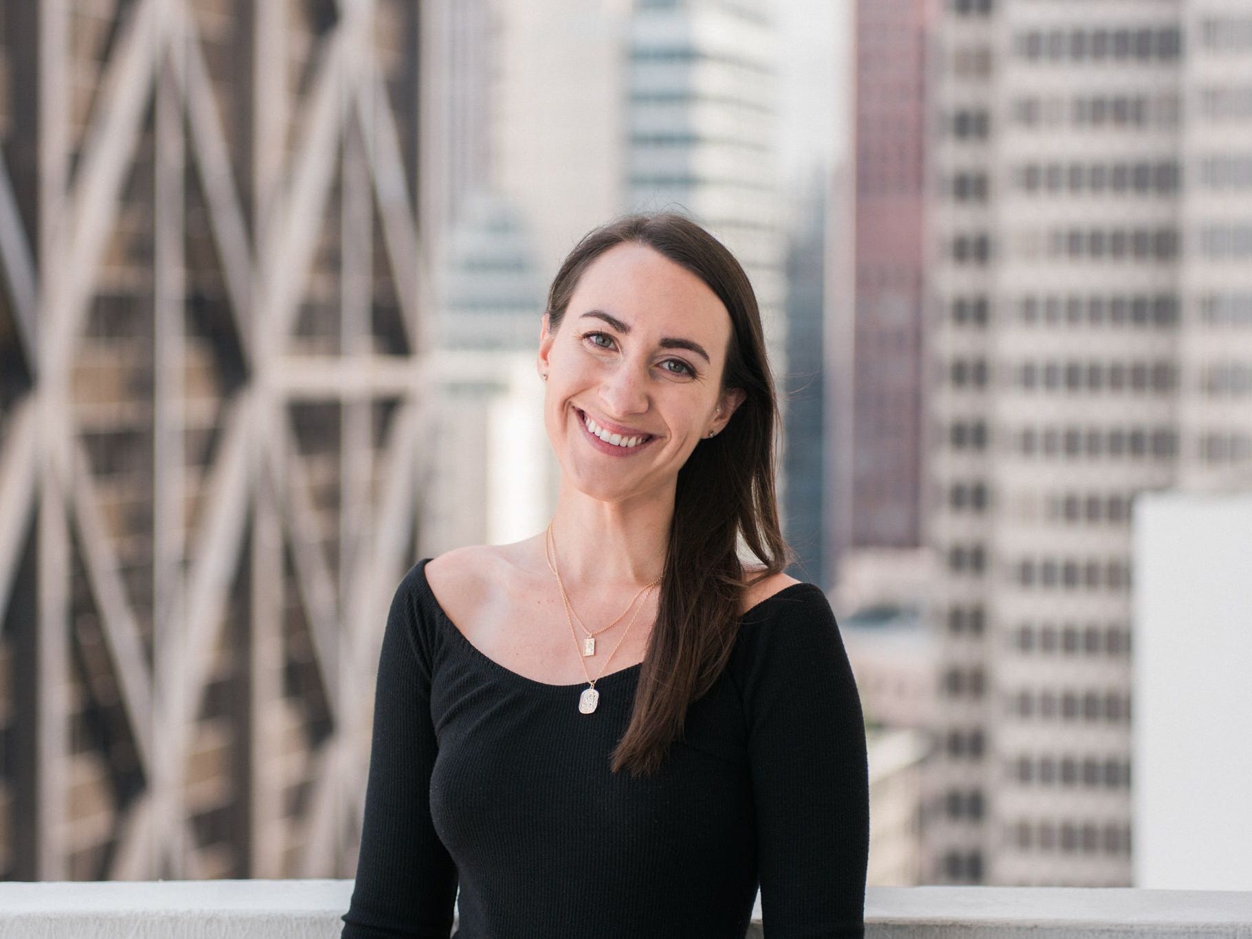 Haley Kowalewski in front of a city skyline