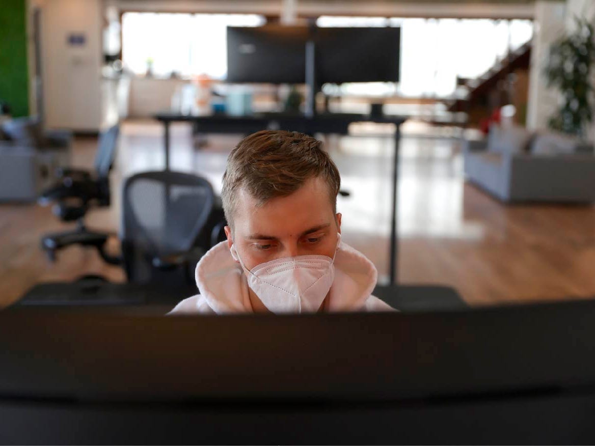 man working office mask