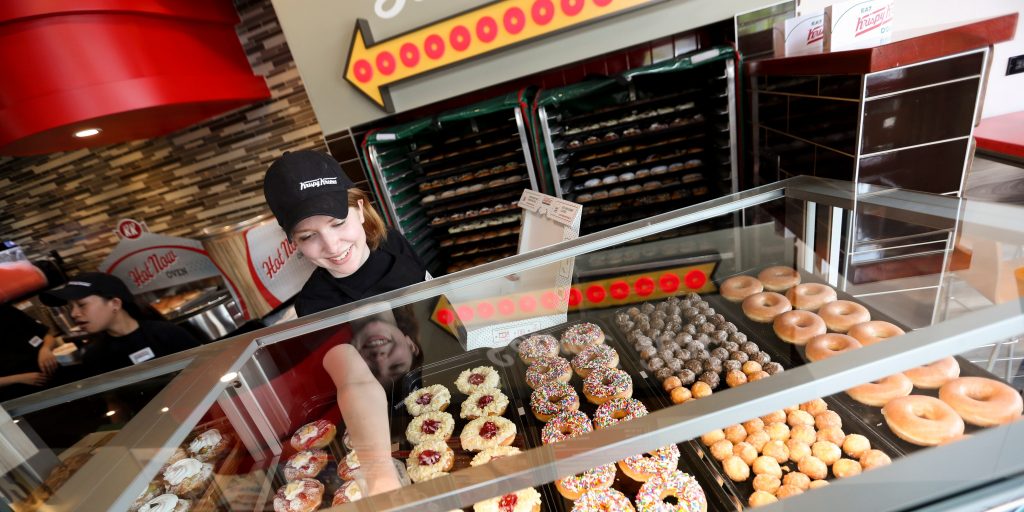 Krispy Kreme climbs 11% in public debut during the busiest IPO week since 2004