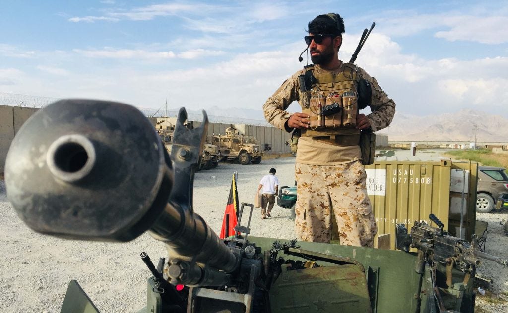 An Afghan National Army soldiers stands watch at Bagram after the departure of US forces