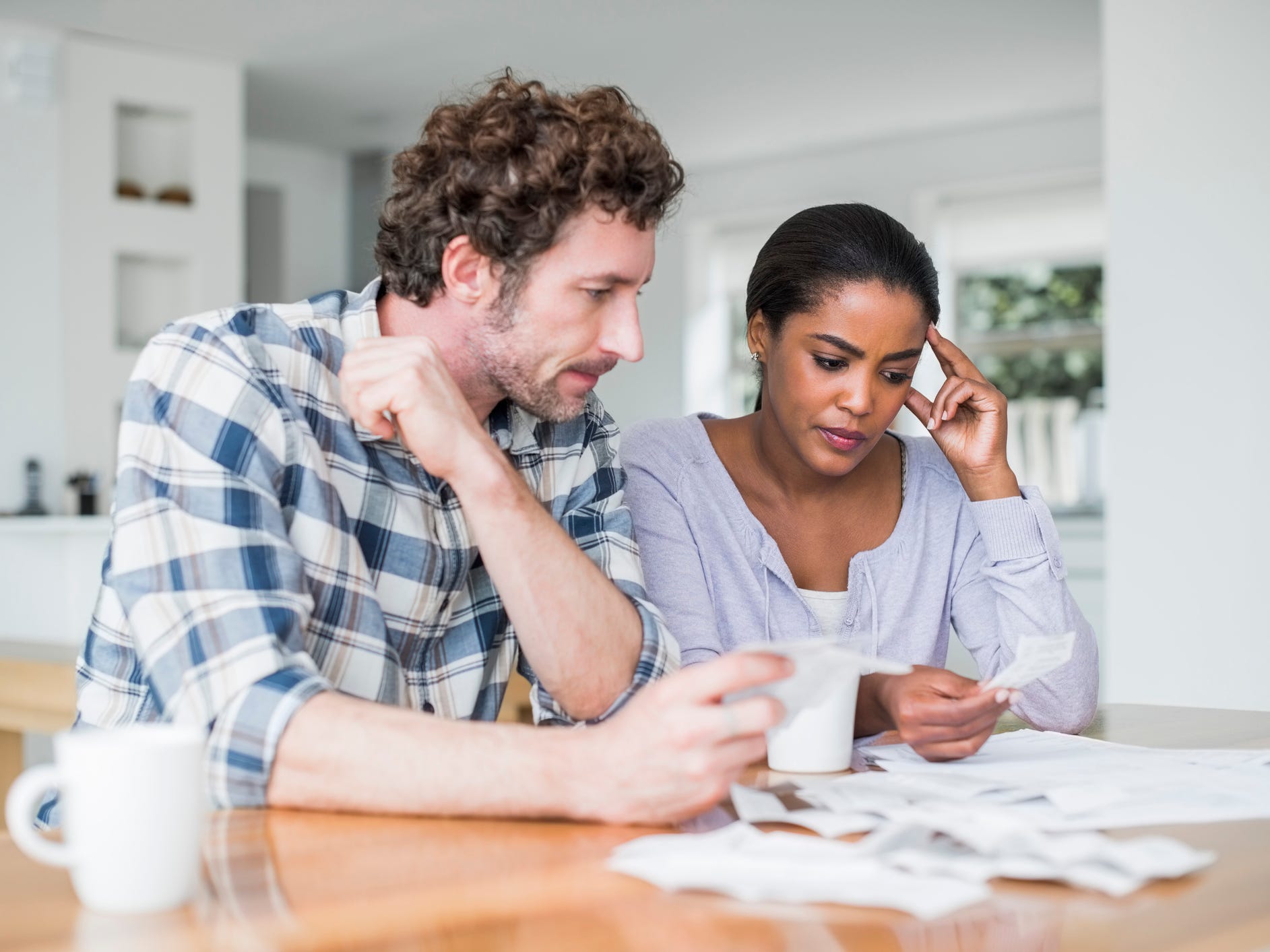 couple looking at bills